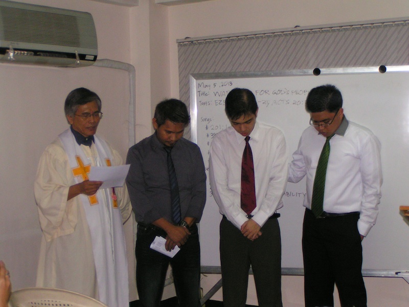 Pastor Nollie is wearing a pulpit gown!